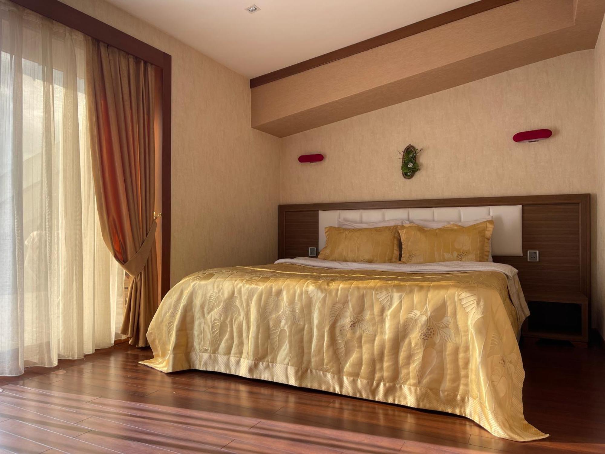 Ladera Resort Qusar Rom bilde